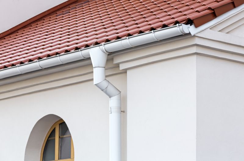 Gutter System with Downspouts